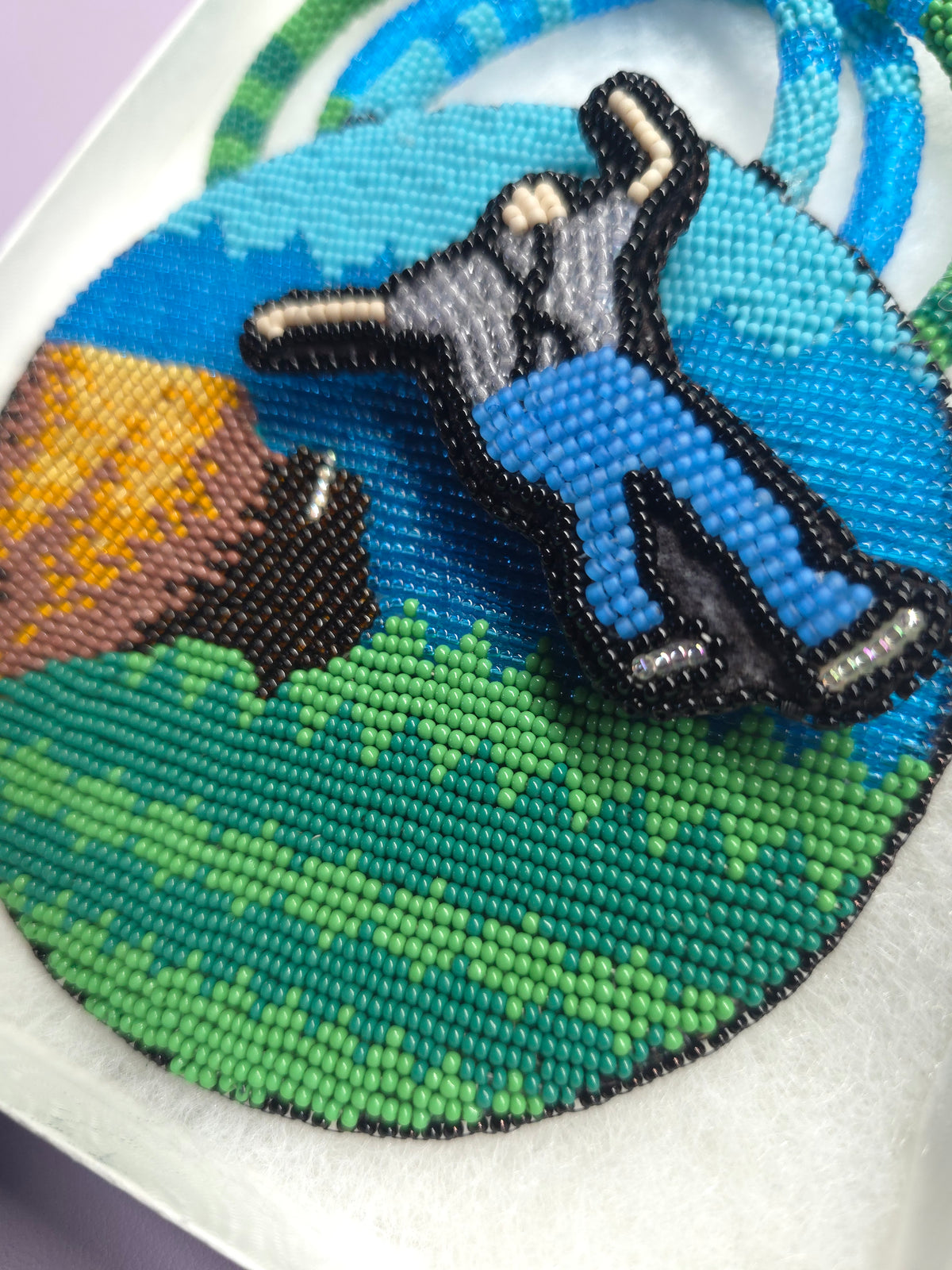 Beaded medallion buffalo and spinning man