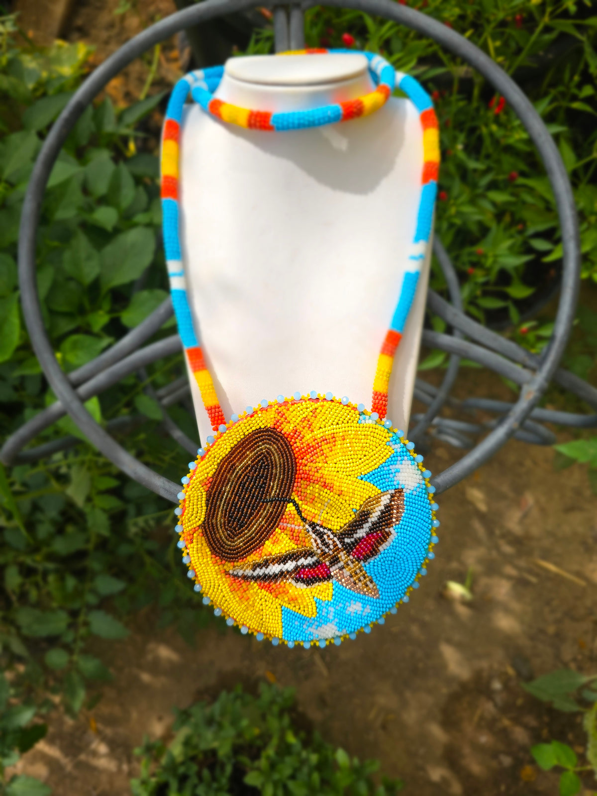 Beaded Hummingbird moth/sunflower medallion