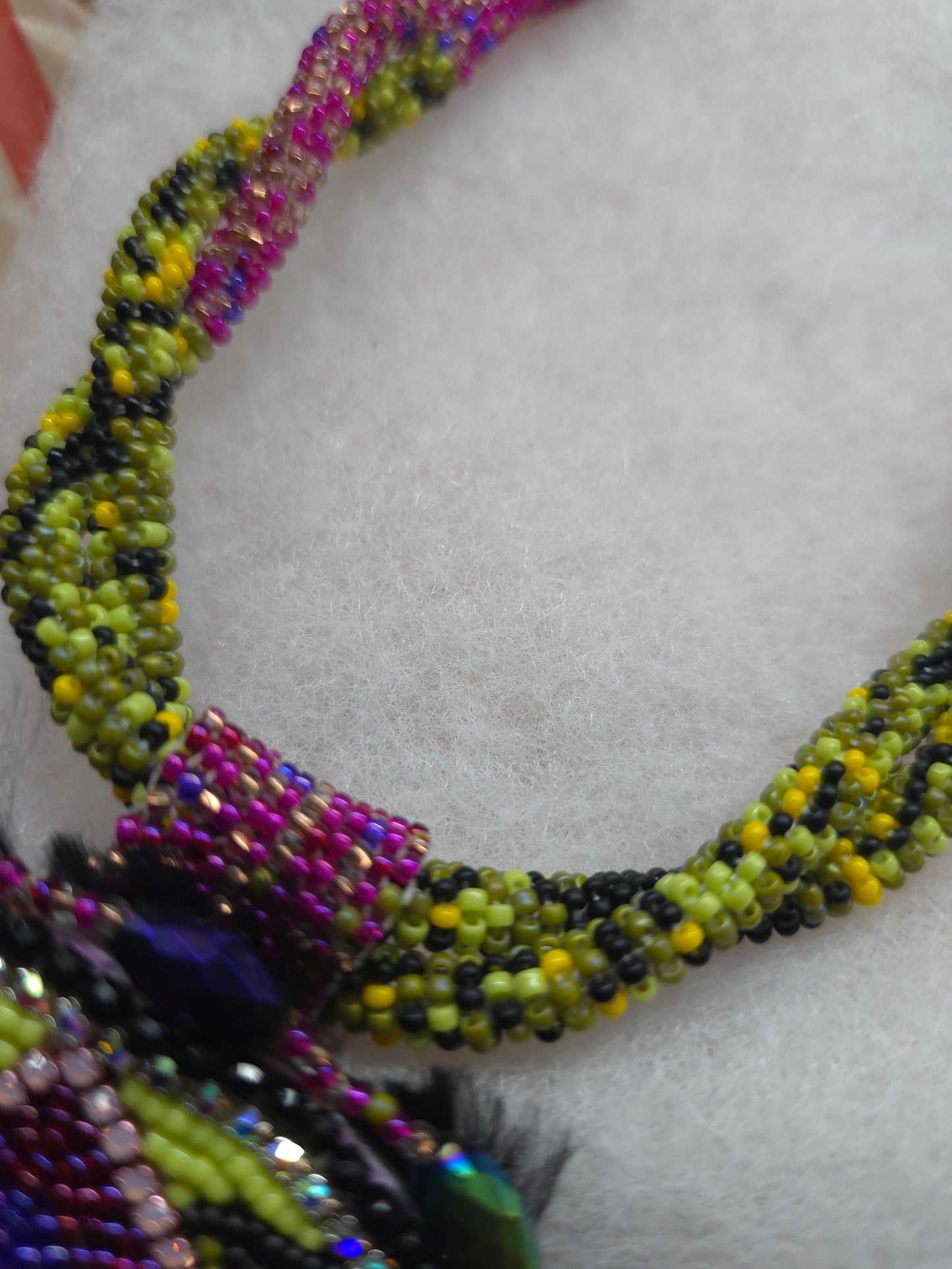 Floral beaded medallion with spinner bees