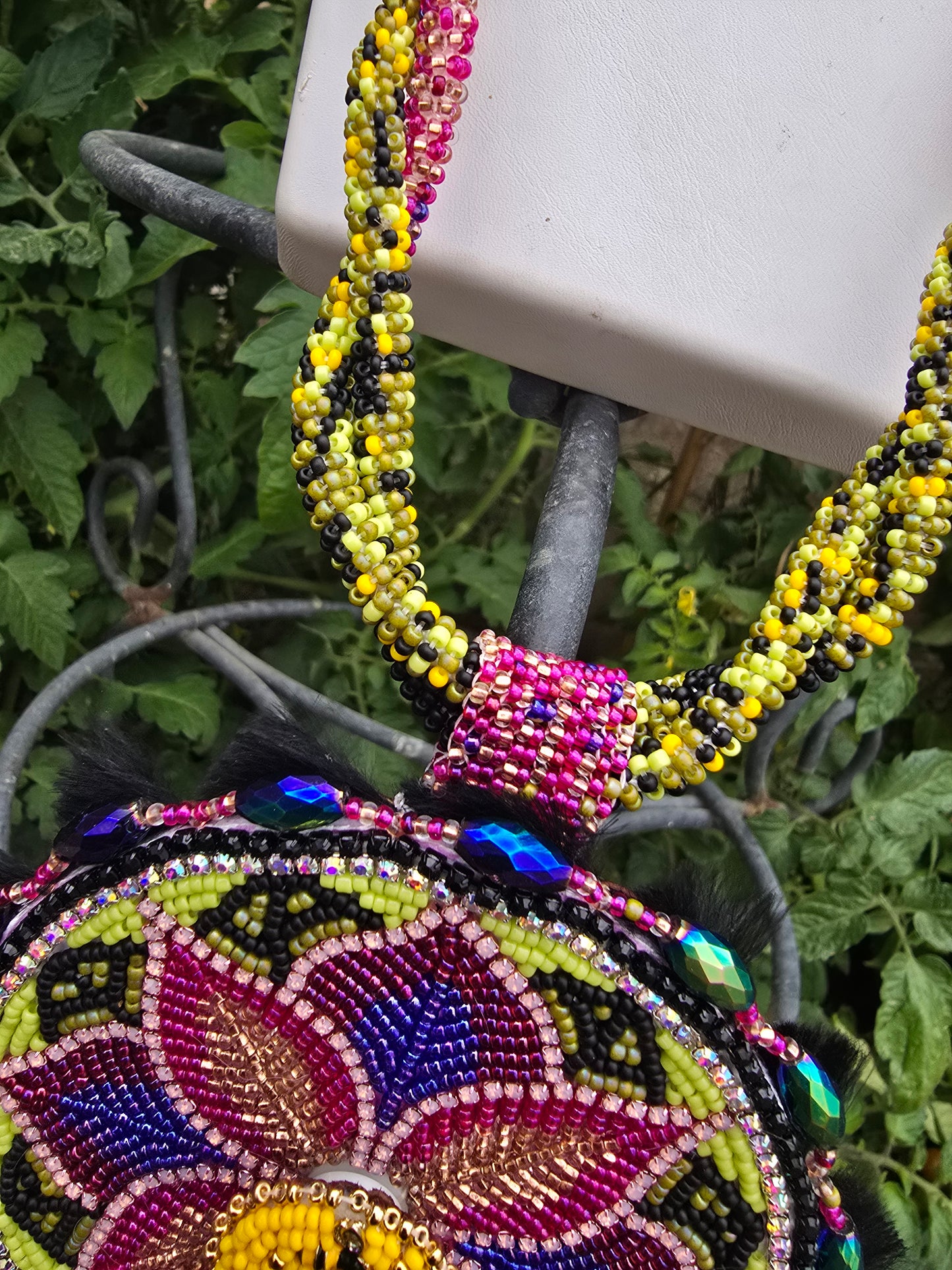 Floral beaded medallion with spinner bees